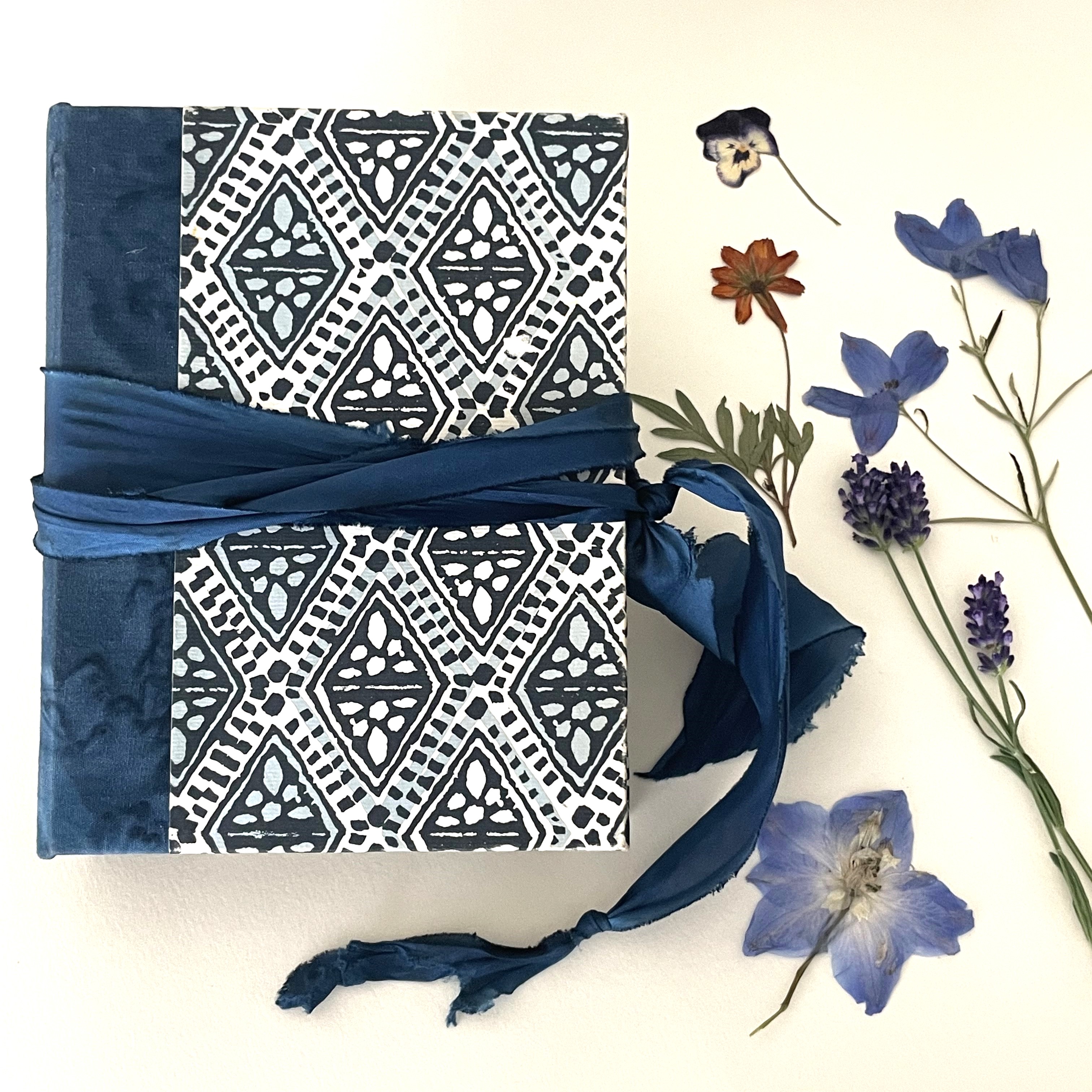 close up of handmade travelers flower press book