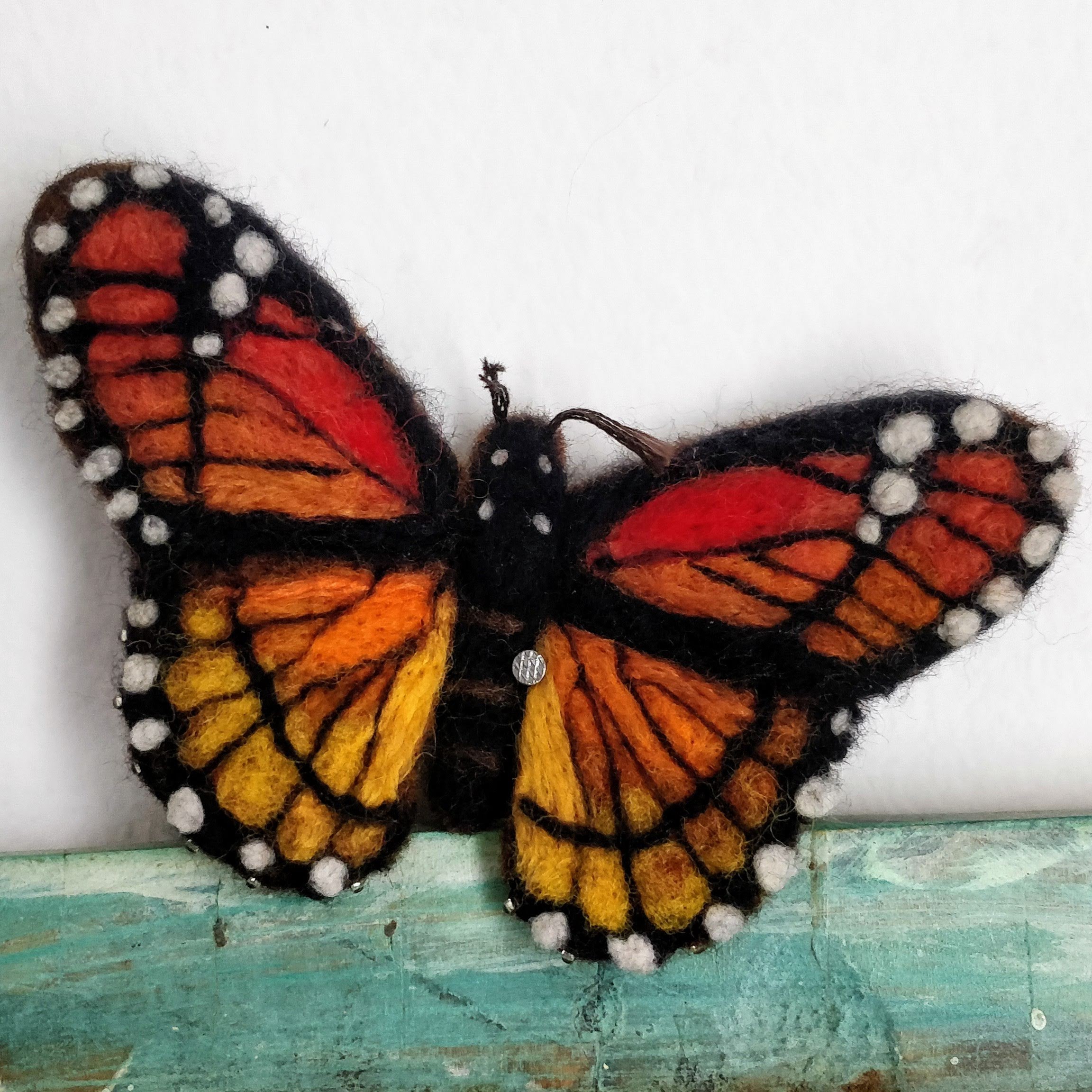 orange and red needle felted butterfly